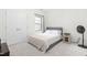 Well-lit bedroom features a large window and double doors at 2140 Stegemann St, Apex, NC 27502