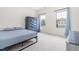 Bright bedroom with two windows and neutral carpet at 2140 Stegemann St, Apex, NC 27502