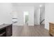 Open bonus room with view of stairs and multiple doorways allowing for easy access at 2140 Stegemann St, Apex, NC 27502