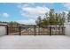 View from a spacious deck with black metal railings showcasing the peaceful residential neighborhood at 2140 Stegemann St, Apex, NC 27502