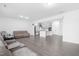 Large living area provides ample space for entertaining with an adjacent modern kitchen at 2140 Stegemann St, Apex, NC 27502