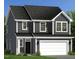 Charming two-story home featuring a two-car garage, gray siding, and white trim, creating a welcoming curb appeal at 230 Steel Spring Rd # 49, Angier, NC 27501