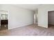Spacious bedroom featuring neutral walls and carpet with attached bathroom and closet at 244 Potomac River St, Garner, NC 27529