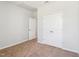 Bedroom featuring neutral walls, carpet, and closet with double doors at 244 Potomac River St, Garner, NC 27529
