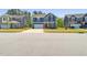 Two-story home boasts a blue exterior, red door, and a well-maintained front yard at 244 Potomac River St, Garner, NC 27529
