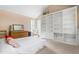 Bright bedroom with vaulted ceiling, built-in shelving, and sunny windows create a relaxing space at 2440 Glencoe St, Burlington, NC 27217