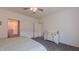 Bright, comfortable bedroom leads to a bathroom and has a view of a dresser at 2912 Epps Clark Rd, Siler City, NC 27344