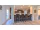 Beautiful kitchen with breakfast bar seating, dark cabinets, modern appliances, and natural light at 2912 Epps Clark Rd, Siler City, NC 27344