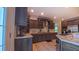 Well-equipped kitchen with stainless steel appliances, elegant countertops, and ample cabinet space at 2912 Epps Clark Rd, Siler City, NC 27344