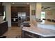 A kitchen featuring stainless steel appliances, and marble countertops, and a breakfast bar at 2912 Epps Clark Rd, Siler City, NC 27344