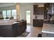 Gourmet kitchen boasts custom cabinets, a stainless steel sink, and modern appliances at 2912 Epps Clark Rd, Siler City, NC 27344