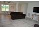 A spacious living room with comfortable seating, an entertainment center, and a neutral color scheme at 2912 Epps Clark Rd, Siler City, NC 27344