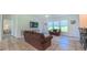 Inviting living room with a neutral palette, abundant natural light, and comfortable seating arrangement at 2912 Epps Clark Rd, Siler City, NC 27344