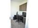 Functional office space with built-in desk, cabinets, and modern gaming chair at 2912 Epps Clark Rd, Siler City, NC 27344