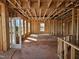 Interior view of exposed wood frame walls and ceiling of a new home with natural light at 3006 Dog Rose Dr # 308, Durham, NC 27703