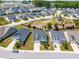 This aerial view showcases a vibrant neighborhood with lush landscaping and a playground at 345 Warm Wind Dr, Clayton, NC 27527