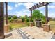 Backyard with grilling area and stone steps leading up to landscaped backyard at 345 Warm Wind Dr, Clayton, NC 27527