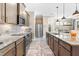 Stylish kitchen featuring granite countertops, stainless steel appliances, and ample cabinet space at 345 Warm Wind Dr, Clayton, NC 27527