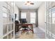 Bright office space with french doors, hardwood floors, and plenty of natural light at 345 Warm Wind Dr, Clayton, NC 27527