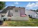 Back of property featuring a well-maintained lawn and a privacy fence at 368 Bayleigh Ct, Garner, NC 27529