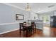 Dining area with hardwood floors and a view of the kitchen at 368 Bayleigh Ct, Garner, NC 27529
