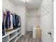 A spacious walk-in closet with ample shelving and hanging space for organized storage at 368 Bayleigh Ct, Garner, NC 27529