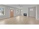 Cozy living room with a white fireplace and wood flooring at 408 W Stallings St, Clayton, NC 27520