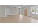 Spacious living room featuring wood floors and natural light at 408 W Stallings St, Clayton, NC 27520