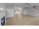Bright living room with modern gray walls and wood floors at 408 W Stallings St, Clayton, NC 27520