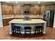 Spacious kitchen with large center island, stainless appliances, and ample cabinet space at 4405 Brighton Ridge Dr, Apex, NC 27539