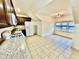 Well-lit kitchen with granite countertops, new appliances, and an adjacent dining area at 4405 Brighton Ridge Dr, Apex, NC 27539