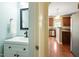 Bathroom and Kitchen featuring updated appliances and a stylish vanity at 4509 Joe Cotton Dr, Knightdale, NC 27545