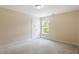 Bedroom with a window and carpet flooring at 4509 Joe Cotton Dr, Knightdale, NC 27545