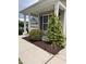 View of the front yard of the home, featuring manicured landscaping and decorative shrubs at 4509 Joe Cotton Dr, Knightdale, NC 27545