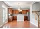 Spacious kitchen featuring stainless steel appliances, hardwood floors, and ample counter space at 4509 Joe Cotton Dr, Knightdale, NC 27545