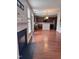 Spacious living room featuring wood floors, fireplace and open access to the kitchen at 4509 Joe Cotton Dr, Knightdale, NC 27545