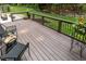 Expansive wooden deck overlooking a lush backyard, ideal for outdoor gatherings at 5025 Martin Farm Rd, Raleigh, NC 27613