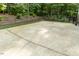 Large backyard concrete patio space ready for outdoor entertaining and relaxing at 5025 Martin Farm Rd, Raleigh, NC 27613