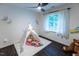 Adorable bedroom featuring cute teepee tent, natural lighting and hardwood floors at 5025 Martin Farm Rd, Raleigh, NC 27613