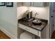 A coffee bar with granite countertops and a Keurig coffeemaker at 5025 Martin Farm Rd, Raleigh, NC 27613