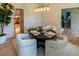 Cozy dining area featuring modern light fixture, elegant decor, and hardwood flooring at 5025 Martin Farm Rd, Raleigh, NC 27613