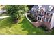 Stunning brick home with manicured lawn and professional landscaping at 5025 Martin Farm Rd, Raleigh, NC 27613