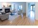 Living room with fireplace, view of office and hall with ornate door at 5025 Martin Farm Rd, Raleigh, NC 27613