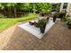Paver patio featuring an outdoor rug and cushioned seating, perfect for relaxation at 5025 Martin Farm Rd, Raleigh, NC 27613