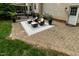 Stone patio features an outdoor seating area at 5025 Martin Farm Rd, Raleigh, NC 27613