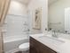 Bathroom with a shower-tub combination, white countertops, and modern fixtures at 648 White Birch Ln, Angier, NC 27501