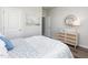 Bright bedroom showcasing a beautifully decorated bed and ample natural light at 648 White Birch Ln, Angier, NC 27501
