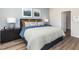 Comfortable main bedroom with stylish nightstands, lamps, and artwork at 648 White Birch Ln, Angier, NC 27501