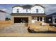 New construction home featuring brick facade and an attached garage ready for customization and personalization at 658 White Birch Ln, Angier, NC 27501