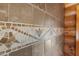 Close up of the intricate tile pattern in this bathroom with neutral, earthy tones at 6707 Frieden Church Rd, Gibsonville, NC 27249
